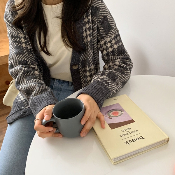 Vesta dama in carouri cu decolteu spitz