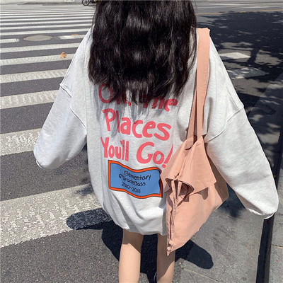 Női alkalmi blúz ovális nyakkivágással és rátéttel