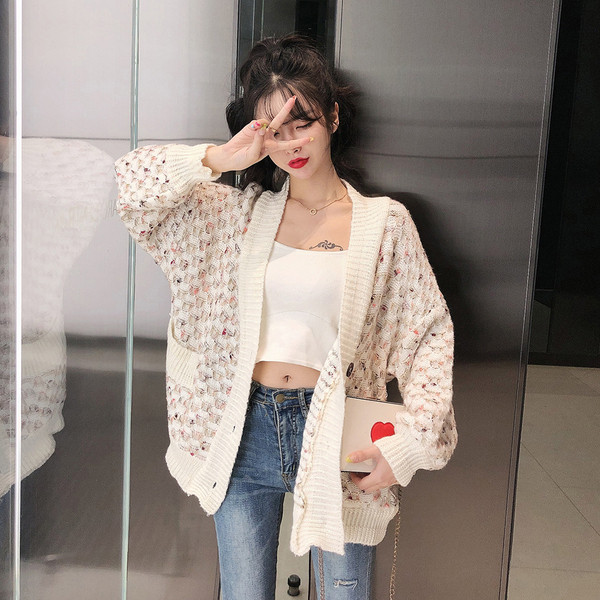 Alkalmi mellény mély nyakkivágással és gombokkal