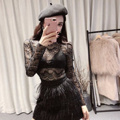 Μοντέρνα γυναικεία φούστα με κρόσσες και ελαστική μέση σε μαύρο χρώμα