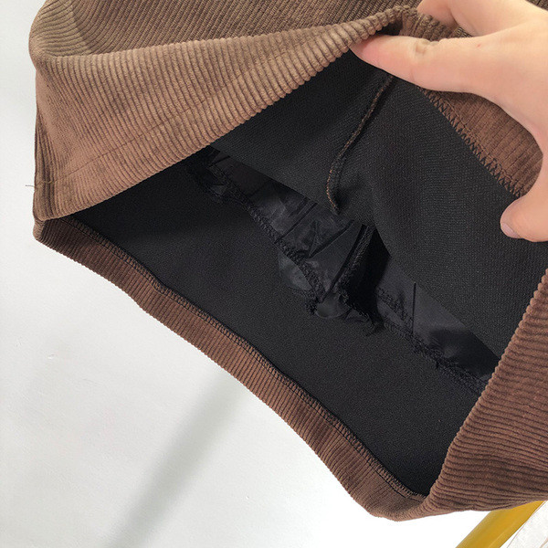 Κοντή γυναικεία φούστα σε μαύρο και καφέ χρώμα