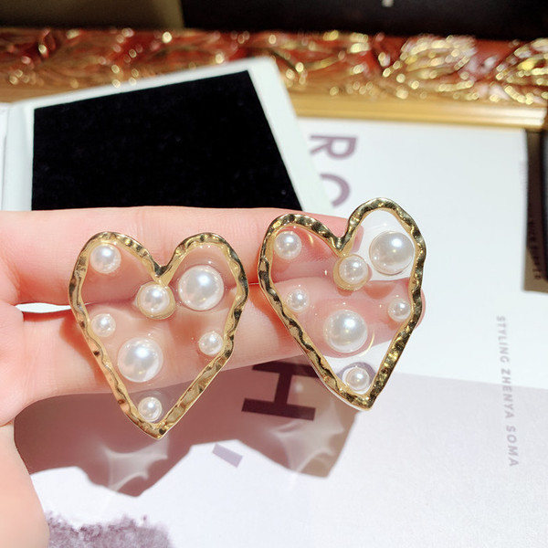 Νέο μοντέλο γυναικεία σκουλαρίκια με πέρλες σε χρυσό χρώμα