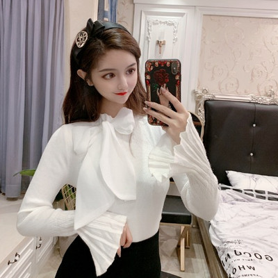 Női pulóver lótusz ujjú fehér és fekete színben