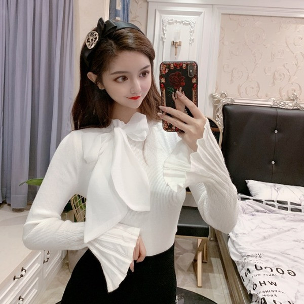 Női pulóver lótusz ujjú fehér és fekete színben