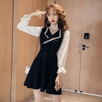 Κομψό γυναικείο φόρεμα σε μαύρο χρώμα με μανίκια 3/4