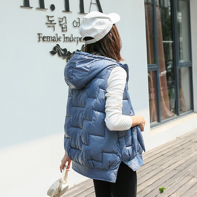 Νέο μοντέλο ασύμμετρο γυναικείο γιλέκο με κουκούλα σε μπλε, μαύρο και άσπρο χρώμα