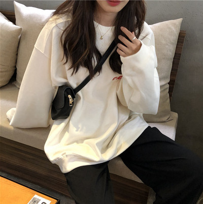 Lezser női blúz kerek nyakkivágással fehér és narancs színben