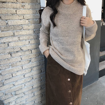 Női téli pulóver hosszú modell magas gallérral több színben