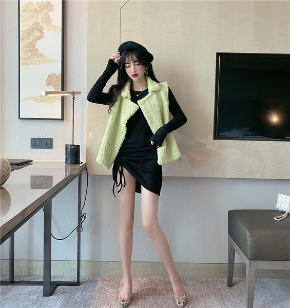 Női pehelymellény zöld és rózsaszín gombokkal