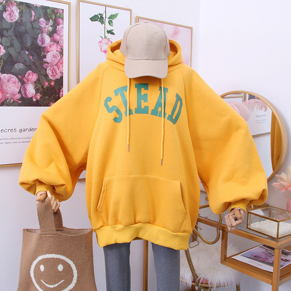 Új modell női pulóver kapucnival és több színben mintával