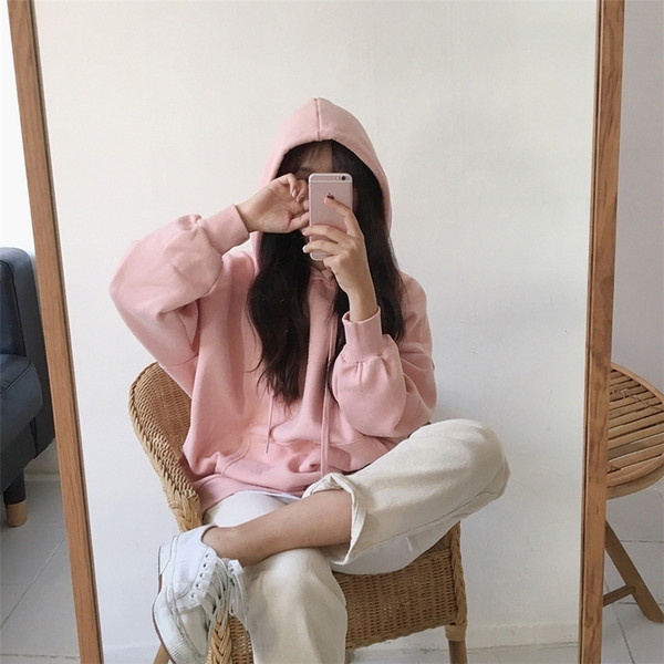 Rózsaszín és kék zsebekkel ellátott, alkalmi női pulóver