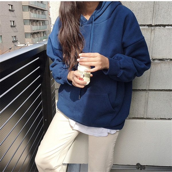 Rózsaszín és kék zsebekkel ellátott, alkalmi női pulóver