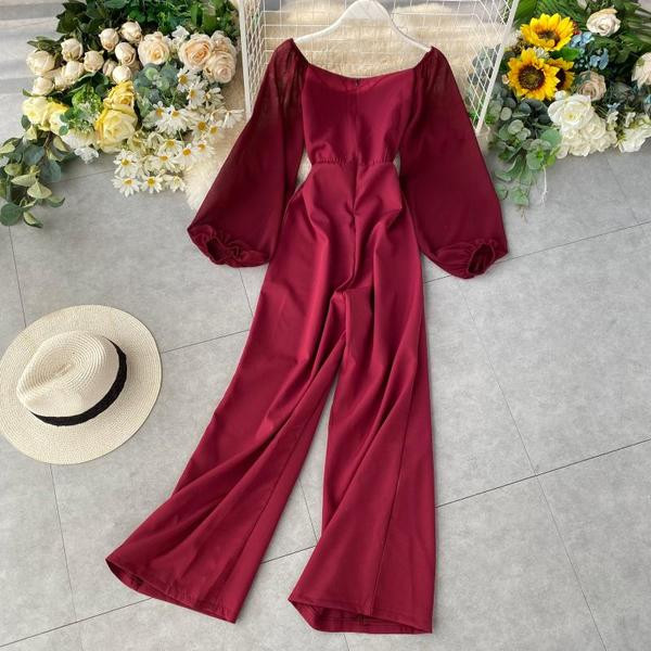 Salopeta lunga de dama cu nasturi si decolteu oval