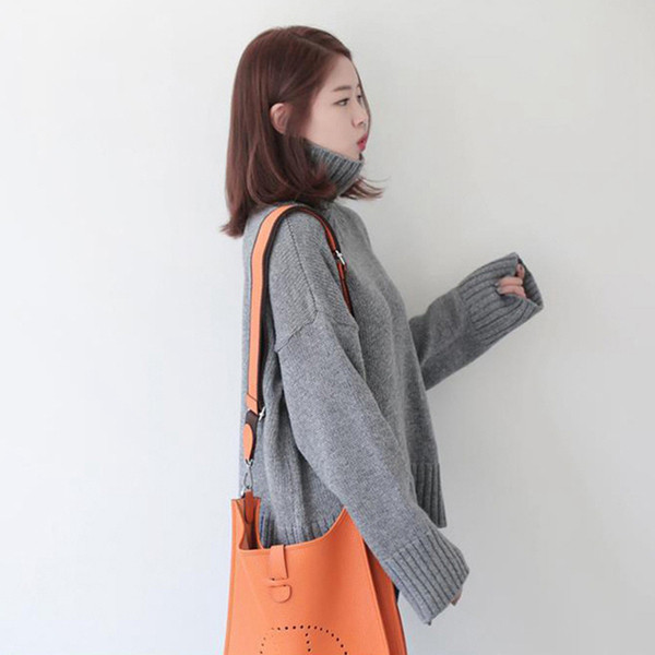 Női modern pulóver széles modell magas gallérral