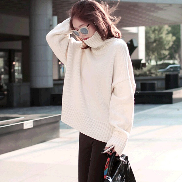 Női modern pulóver széles modell magas gallérral