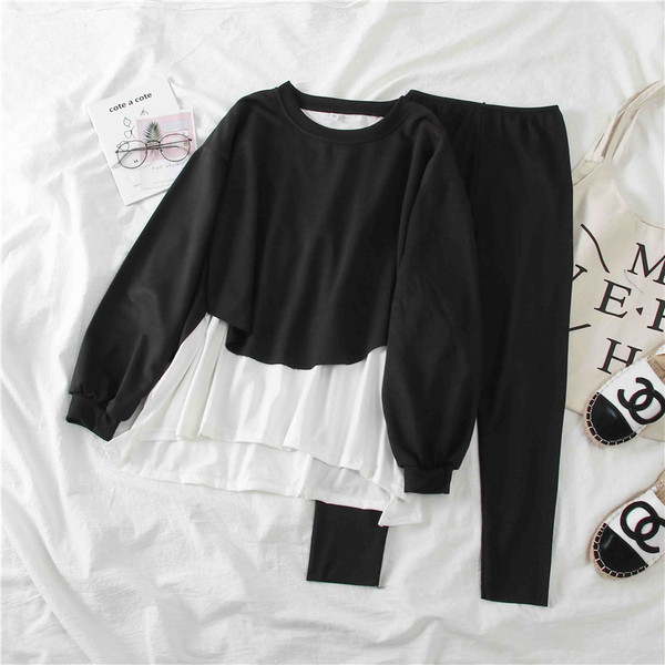 Női sport szett szürke és fekete blúzból és leggingsből