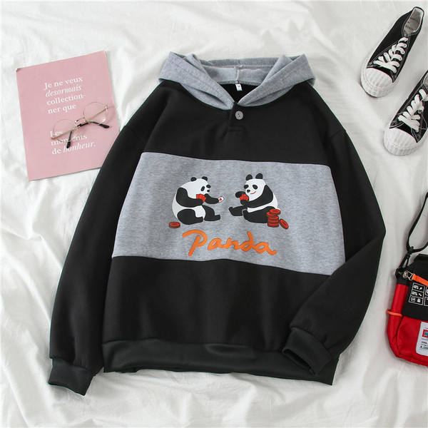 Női alkalmi pulóver kapucnival és fekete mintával