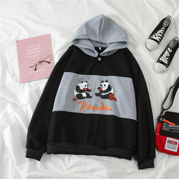 Női alkalmi pulóver kapucnival és fekete mintával