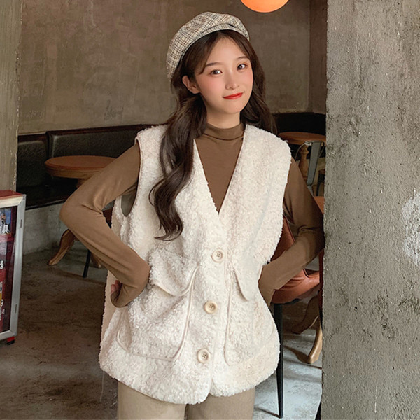 Vesta de dama in doua culori cu buzunare si nasturi