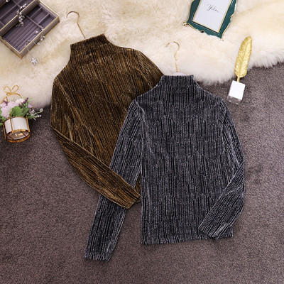 Modern női blúz magas gallérral, ezüst és arany színben