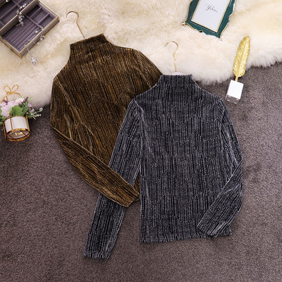 Modern női blúz magas gallérral, ezüst és arany színben