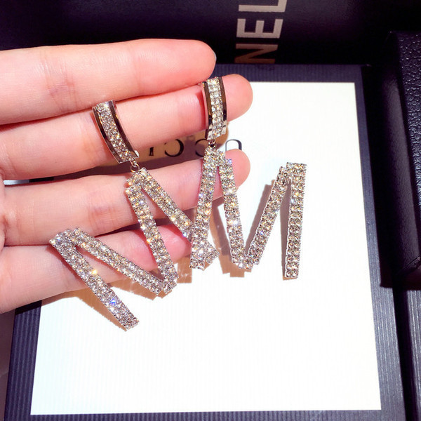 Κορυφαία γυναικεία σκουλαρίκια με πέτρες σε χρυσό και ασημί χρώμα