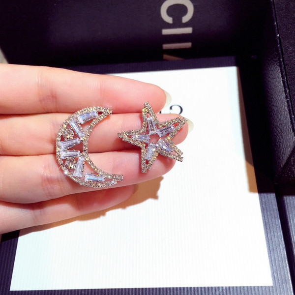 Női fülbevaló ezüst színű kövekkel