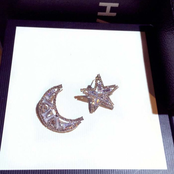 Női fülbevaló ezüst színű kövekkel