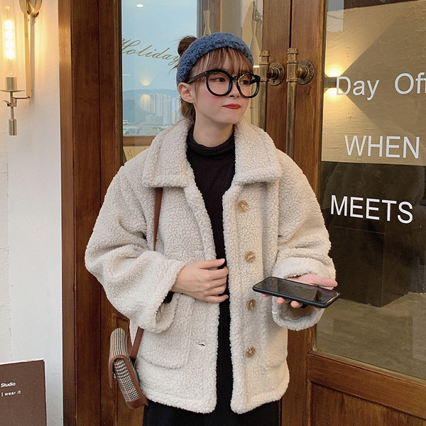 Palton de dama model larg cu nasturi si buzunare