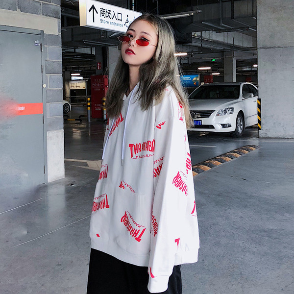 Női alkalmi pulóver fehér felirattal