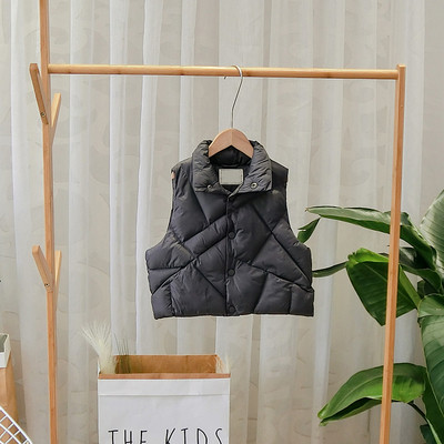 Νέο μοντέλο γυναικείο γιλέκο με κουμπιά σε μπεζ και μαύρο χρώμα