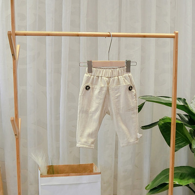 Modern, barna, bézs, fekete és zöld zsebes gyereknadrág