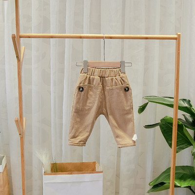 Modern, barna, bézs, fekete és zöld zsebes gyereknadrág