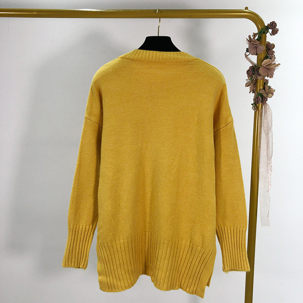 Μακρύ και φαρύ πουλόβερ σε λευκό και κίτρινο χρώμα