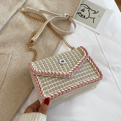 Μοντέρνα γυναικεία τσάντα με μεταλλική στερέωση σε διάφορα χρώματα