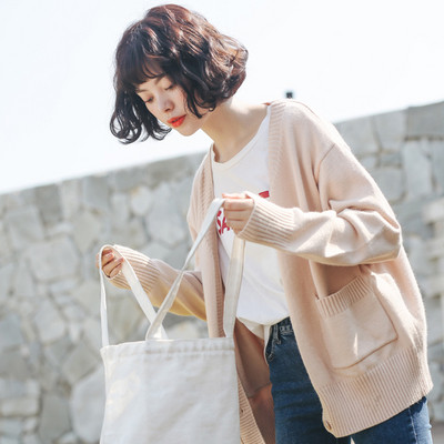 Női mellény zsebbel és gombokkal, két színben