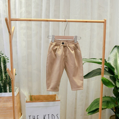 Μοντέρνα παιδικά παντελόνια για αγόρια σε μαύρο και καφέ χρώμα