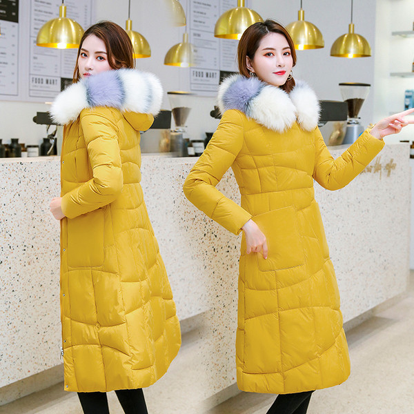 Női téli kabát csuklyás pehely hosszú modell zsebbel több színben