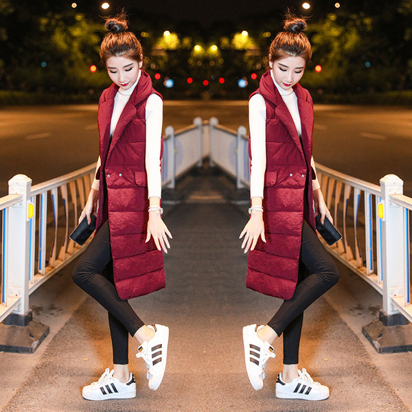 Γυναικείο μακρύ γιλέκο με κουμπιά σε μαύρο και κόκκινο χρώμα