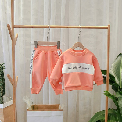 Modern gyerekkészlet fiúknak, két részből áll, fekete és narancs színben