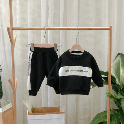 Modern gyerekkészlet fiúknak, két részből áll, fekete és narancs színben