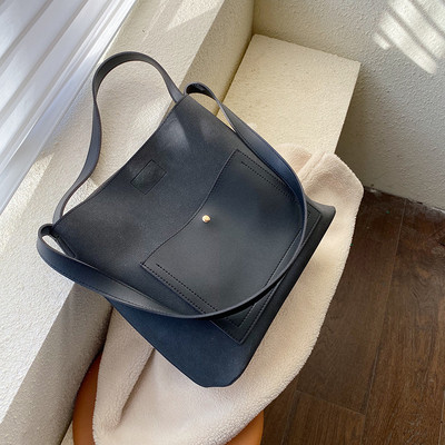 Μοντέρνα γυναικεία τσάντα με μακριά λαβή σε διάφορα χρώματα