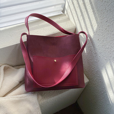 Μοντέρνα γυναικεία τσάντα με μακριά λαβή σε διάφορα χρώματα