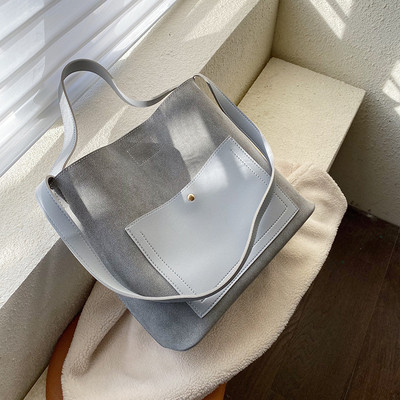 Μοντέρνα γυναικεία τσάντα με μακριά λαβή σε διάφορα χρώματα