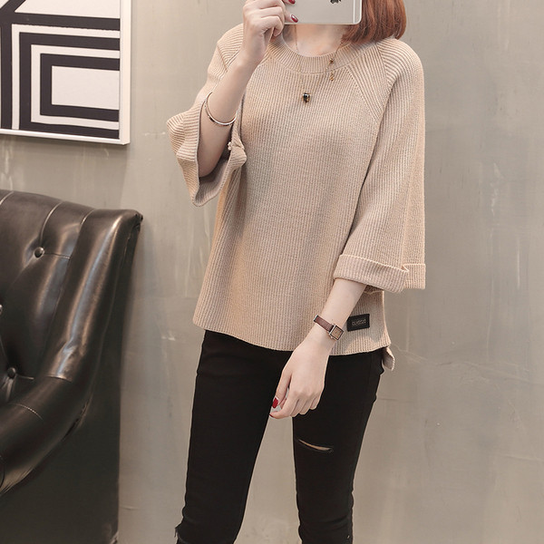 Bluză de damă modernă asimetrică cu decolteu oval și mâneci 3/4