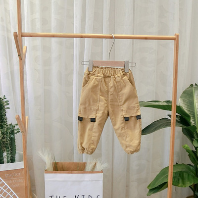 Gyermek sportnadrág zöld és barna zsebekkel