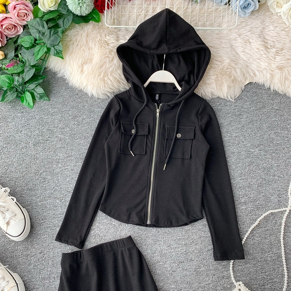 Két részből álló női sportkészlet fehér, szürke és fekete színben