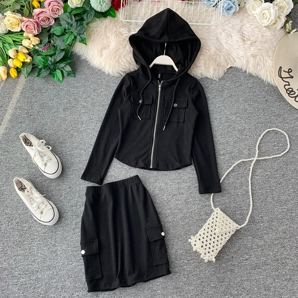 Két részből álló női sportkészlet fehér, szürke és fekete színben