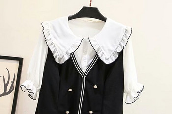 Μοντέρνο γυναικείο φόρεμαμε 3/4 μανίκια σε μαύρο χρώμα με λαιμόκοψη O