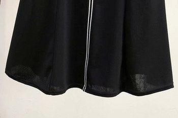 Μοντέρνο γυναικείο φόρεμαμε 3/4 μανίκια σε μαύρο χρώμα με λαιμόκοψη O